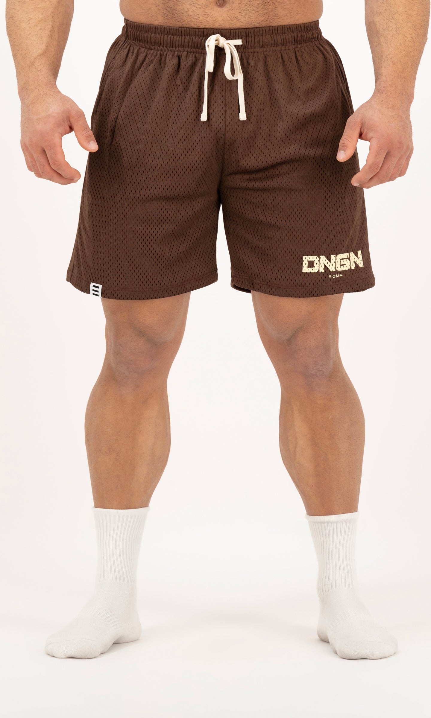 Brown shorts with a logo on a white background