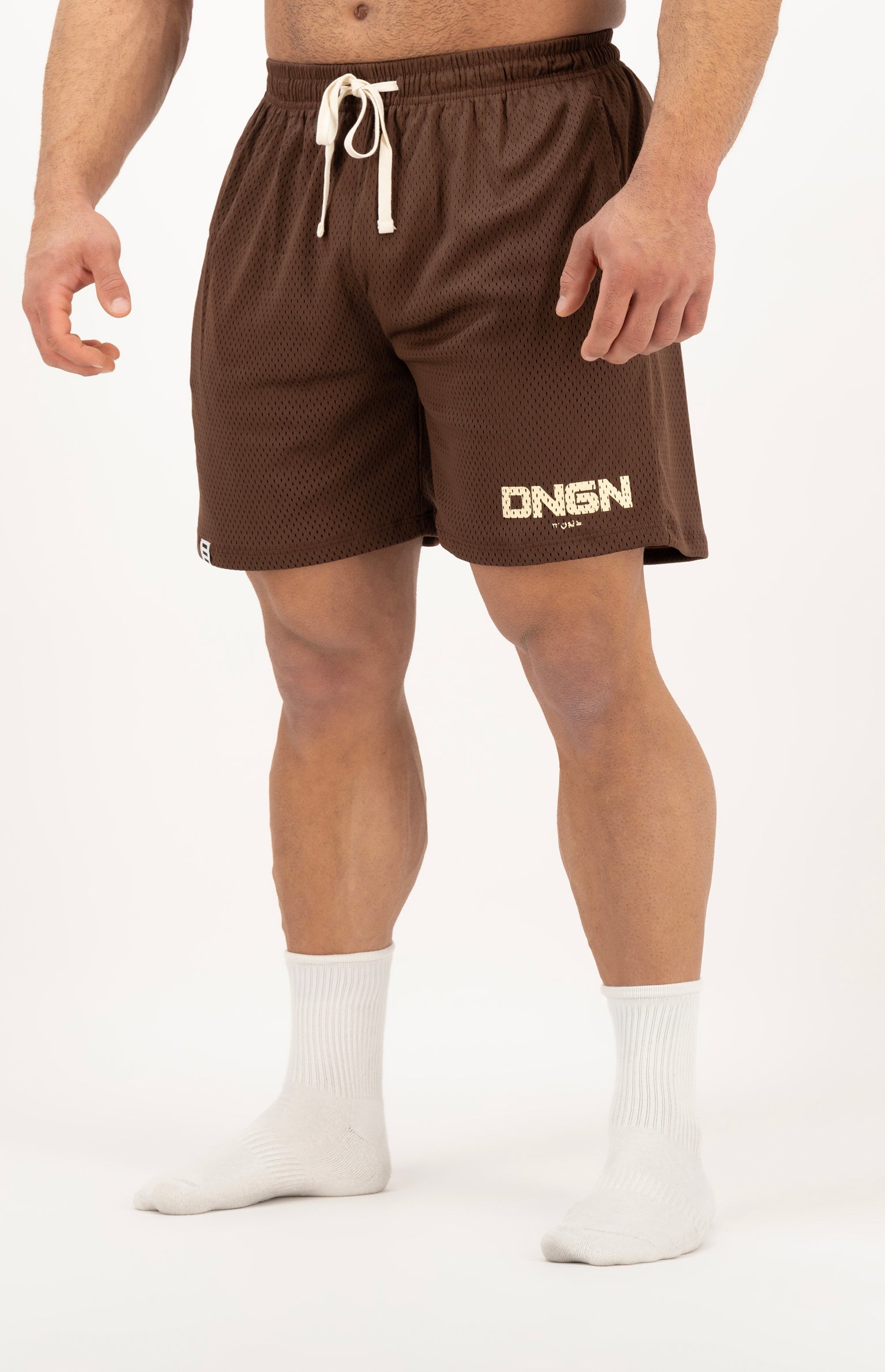 Brown shorts with a brand logo on a white background